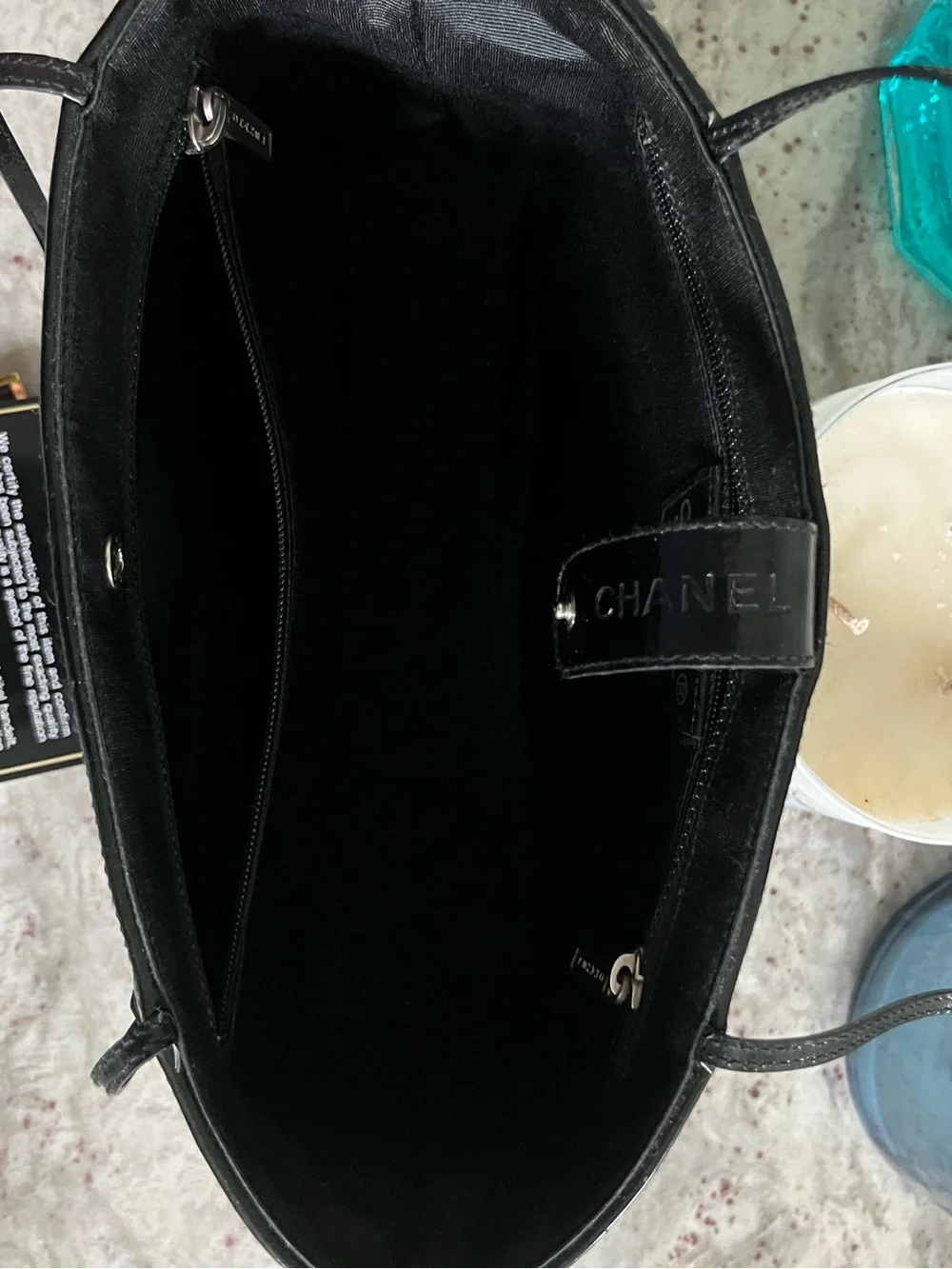 CHANEL Patent Canvas Fringe/quilted floral print bag.